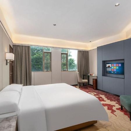 Mizparton Hotel South Qianjin Road Heshan  المظهر الخارجي الصورة
